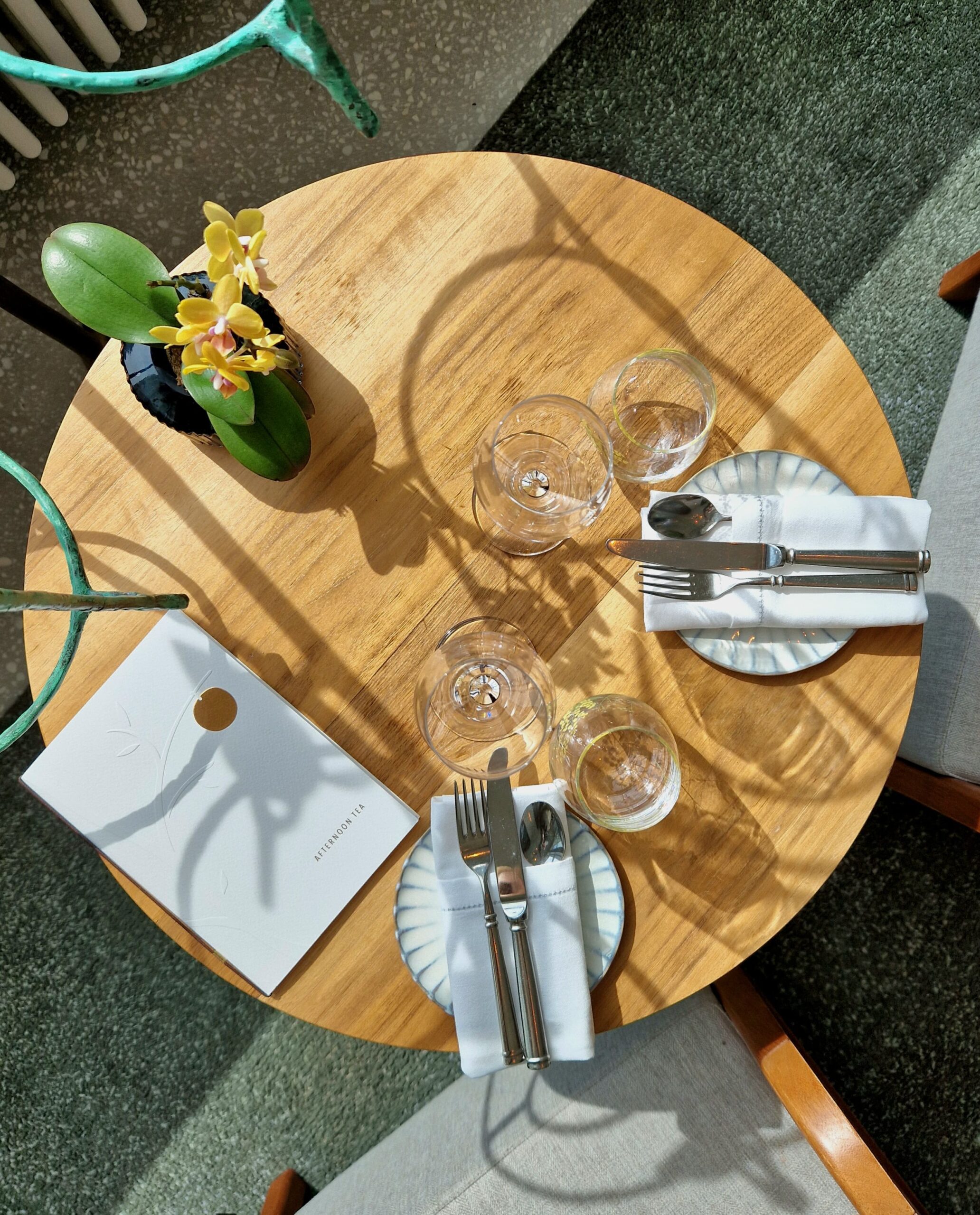 Mastering Etiquette - Omani Culture A beautifully set table, emphasizing proper dining etiquette and social gathering manners